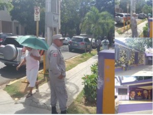 Agentes PN vigilan casa nacional PLD tras lanzamiento bomba molotov