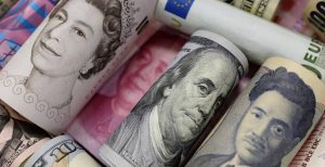 La Reserva Federal empuja al dólar que avanza hacia la paridad con el euro
