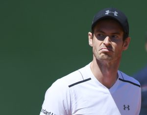 Britains Andy Murray reacts aftetr being defeatead by Spain's  Albert Ramos-Vinolas at the end of their Monte-Carlo ATP Masters Series tennis tournament on April 20, 2017 in Monaco. / AFP / Yann COATSALIOU