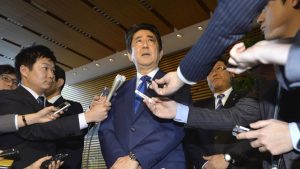 Japanese Prime Minister Shinzo Abe speaks to the media as he expresses support for the U.S. missile attack on a Syrian government-controlled air base at his official residence in Tokyo Friday, April 7, 2017. Abe on Friday said Japan understood and supported the U.S. strategy, saying the strikes were 