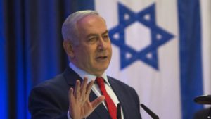 Israeli Prime Minister Benjamin Netanyahu gestures as he speaks during a conference at the Foreign Ministry in Jerusalem, Thursday, Dec. 7, 2017. Netanyahu says President Donald Trump 