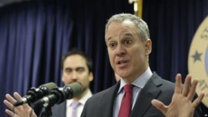 FILE- In this March 21, 2016 file photo, New York Attorney General Eric Schneiderman. Two weeks after officials in two dozen states asked Donald Trump to kill one of President Barack Obama's plans to curb global warming, Schneiderman was lead author on a rebuttal letter signed by Democratic attorneys general in 15 states, plus four cities and counties, asking the president-elect to save it.
(AP Photo/Seth Wenig, File)