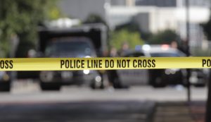 epa05416208 Federal and State officials investigate the crime scene where Micah Johnson gunned down twelve police officers, in Dallas, Texas, USA, 08 July 2016. On 07 July 2016, military veteran Micah Johnson open fire during a peaceful protest held in response the killing of two black men by police in Minnesota and Louisiana; Johnson killed five police officers and injured seven. EPA/RALPH LAUER CORBIS OUT
