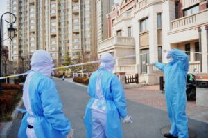 This undated photo shows health workers in Qingdao, China. EFE-EPA/YU FANGPING/FILE