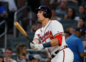 ATLANTA, GEORGIA - MAY 15:  Austin Riley #27 of the Atlanta Braves hits his first Major League home run in the fourth inning during his MLB debut against the St. Louis Cardinals at SunTrust Park on May 15, 2019 in Atlanta, Georgia. (Photo by Kevin C. Cox/Getty Images)