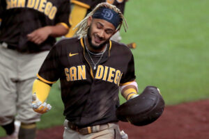 ARLINGTON, TEXAS - AUGUST 17: Fernando Tatis Jr. #23 of the San Diego Padres celebrates after hitting a grand slam against the Texas Rangers in the top of the eighth inning at Globe Life Field on August 17, 2020 in Arlington, Texas. (Photo by Tom Pennington/Getty Images)